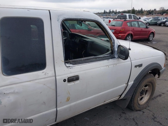 1999 Ford Ranger XLT with VIN 1FTZR15XXXTA09502, listed as a IAAI auction lot 41794904 with 203,276 mi miles. Bid and sale history available at carsss.com. Image 13.