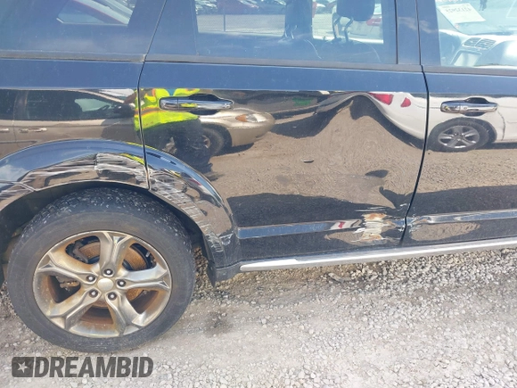 2015 Dodge Journey Crossroad with VIN 3C4PDDGG8FT633483, listed as a IAAI auction lot 42132925 with 138,235 mi miles and . Bid and sale history available at DreamBid. Image 6.