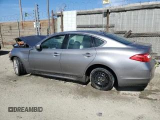 2012 Infiniti M Hybrid with VIN JN1EY1APXCM910481, listed as a Copart auction lot 52943285 with Not Provided miles and Salvage Title. Bid and sale history available at DreamBid. Image 2.