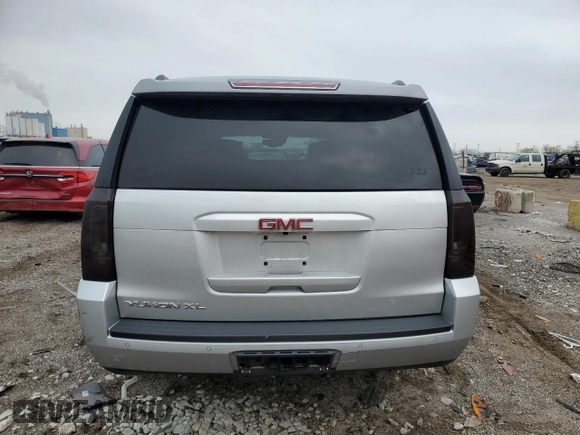2017 GMC Yukon XL SLT with VIN 1GKS2GKC0HR368385, listed as a Copart auction lot 54260245 with 90,942 mi miles and Salvage title. Bid and sale history available at DreamBid. Image 6.