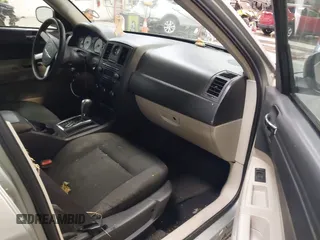 2005 Chrysler 300 with VIN 2C3JA43R55H569369, listed as a IAAI auction lot 41132751 with 123,253 mi miles. Bid and sale history available at carsss.com. Image 5.