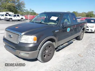 2005 Ford F-150 XLT with VIN 1FTPX12575NA61851, listed as a IAAI auction lot 41713974 with 251,639 mi miles. Bid and sale history available at carsss.com. Image 2.