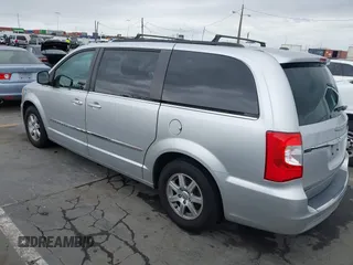 2011 Chrysler Town & Country Touring with VIN 2A4RR5DG2BR665177, listed as a IAAI auction lot 42213478 with 163,961 mi miles and . Bid and sale history available at DreamBid. Image 3.