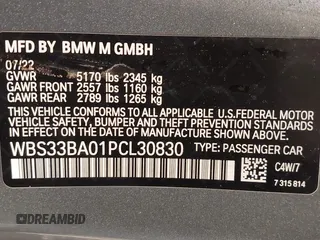 2023 BMW M4 Competition xDrive with VIN WBS33BA01PCL30830, listed as a IAAI auction lot 41402469 with 21,796 mi miles. Bid and sale history available at carsss.com. Image 9.