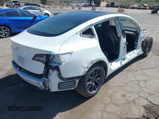 2018 Tesla Model 3 Long Range Battery with VIN 5YJ3E1EAXJF108781, listed as a IAAI auction lot 41962628 with 61,208 mi miles and . Bid and sale history available at DreamBid. Image 4.