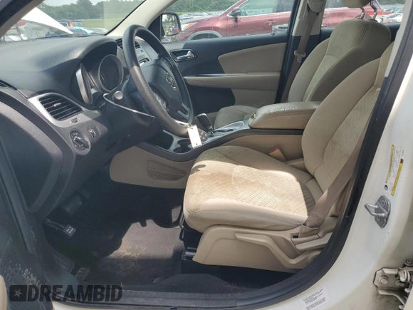 2014 Dodge Journey American Value with VIN 3C4PDCAB3ET216889, listed as a Copart auction lot 60874265 with 117,508 mi miles and Salvage title. Bid and sale history available at DreamBid. Image 7.