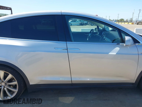 2016 Tesla Model X P90D with VIN 5YJXCAE49GF001067, listed as a IAAI auction lot 41980455 with 94,746 mi miles. Bid and sale history available at carsss.com. Image 13.