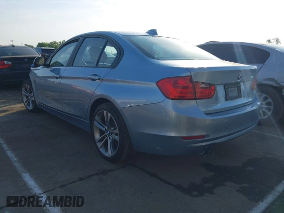 2012 BMW 3 Series 328i with VIN WBA3A5C50CF346823, listed as a IAAI auction lot 42161682 with 76,729 mi miles and . Bid and sale history available at carsss.com. Image 3.