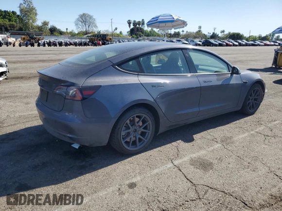 2023 Tesla Model 3 с VIN 5YJ3E1EAXPF607931, выставлен на аукционе Copart как лот 52629305 с пробегом 87 785 миль миль и Списание • Salvage title. История ставок и продаж доступна на DreamBid. Изображение 3.