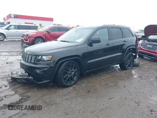 2022 Jeep Grand Cherokee Laredo X with VIN 1C4RJEAG0NC126796, listed as a IAAI auction lot 40755171 with 50,159 mi miles and . Bid and sale history available at DreamBid. Image 2.