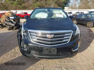 2019 Cadillac XT5 Luxury FWD z VIN 1GYKNCRSXKZ102866, wystawiony jako IAAI lot #41335840 z przebiegiem 59 563 mil mil oraz . Historia ofert i sprzedaży dostępna na DreamBid. Obrazek 12.