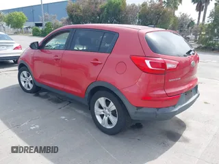 2013 Kia Sportage LX with VIN KNDPBCA26D7355889, listed as a IAAI auction lot 42054415 with 136,859 mi miles and . Bid and sale history available at carsss.com. Image 3.