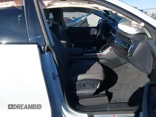 2021 Audi Q8 Premium Plus z VIN WA1EVAF12MD032227, wystawiony jako IAAI lot #41193948 z przebiegiem Nie podano mil oraz . Historia ofert i sprzedaży dostępna na DreamBid. Obrazek 5.