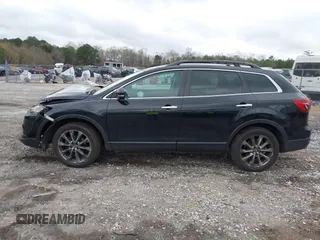 2015 Mazda CX-9 Grand Touring with VIN JM3TB3DV8F0462823, listed as a IAAI auction lot 41863462 with 91,043 mi miles. Bid and sale history available at carsss.com. Image 14.