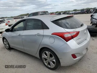 2013 Hyundai Elantra GT with VIN KMHD35LEXDU120945, listed as a Copart auction lot 76704754 with 107,043 mi miles and Salvage Title. Bid and sale history available at carsss.com. Image 2.