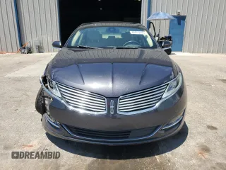 2013 Lincoln MKZ z VIN 3LN6L2GK4DR817557, wystawiony jako Copart lot #60876995 z przebiegiem 77 303 mil mil oraz Szkoda całkowita • Salvage title. Historia ofert i sprzedaży dostępna na DreamBid. Obrazek 5.