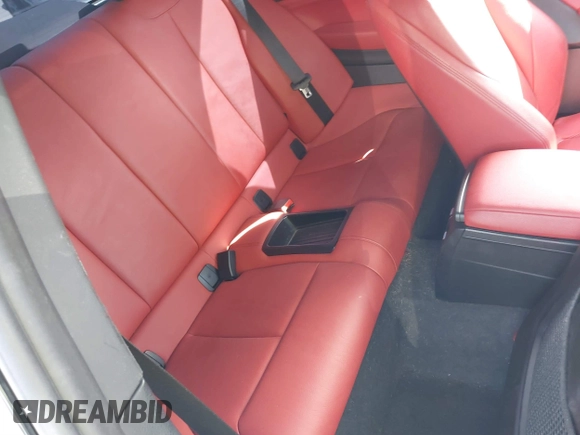 2014 BMW 2 Series M235i with VIN WBA1J7C51EVX33702, listed as a IAAI auction lot 41713337 with 83,076 mi miles. Bid and sale history available at carsss.com. Image 8.