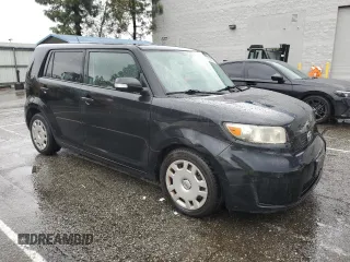 2009 Scion xB with VIN JTLKE50EX91071110, listed as a Copart auction lot 48939845 with 163,798 mi miles and Salvage Title. Bid and sale history available at DreamBid. Image 4.