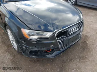 2016 Audi A3 e-tron Premium with VIN WAUUPBFF6GA138034, listed as a IAAI auction lot 41524489 with 90,453 mi miles. Bid and sale history available at carsss.com. Image 6.