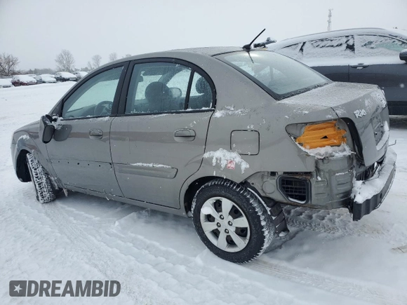 2010 Kia Rio with VIN KNADH4B33A6617736, listed as a Copart auction lot 45469215 with 233,539 mi miles and Clean Title. Bid and sale history available at DreamBid. Image 2.