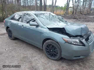2009 Toyota Camry LE with VIN 4T1BK46K79U591447, listed as a IAAI auction lot 41723033 with 202,048 mi miles. Bid and sale history available at carsss.com. Image 1.