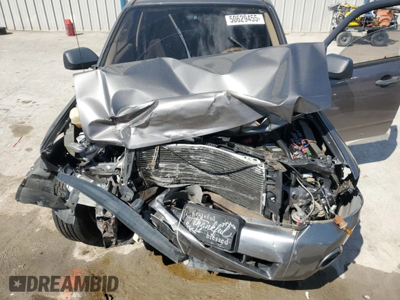 2012 Ford Escape XLS z VIN 1FMCU9C75CKB46512, wystawiony jako Copart lot #50629455 z przebiegiem Nie podano mil oraz Nie do naprawy • Non repairable. Historia ofert i sprzedaży dostępna na DreamBid. Obrazek 12.