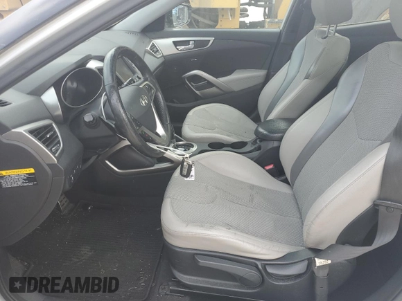 2012 Hyundai Veloster w/Black Int с VIN KMHTC6AD2CU063070, выставлен на аукционе Copart как лот 60391315 с пробегом 153 745 миль миль и Списание • Salvage title. История ставок и продаж доступна на DreamBid. Изображение 7.