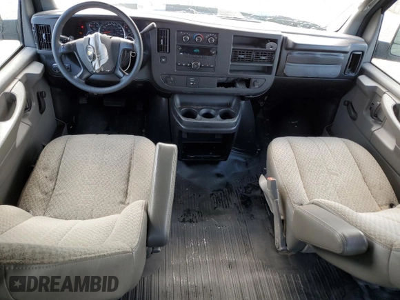2008 Chevrolet Express Cargo with VIN 1GCGG25C781137094, listed as a Copart auction lot 56494395 with 100,037 mi miles and Salvage title. Bid and sale history available at DreamBid. Image 8.