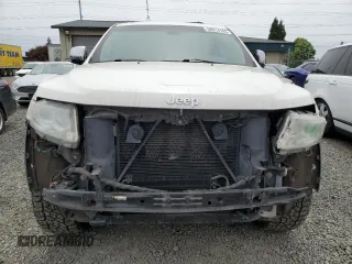 2011 Jeep Grand Cherokee Overland with VIN 1J4RR6GT9BC696319, listed as a Copart auction lot 56914185 with 211,661 mi miles and Salvage title. Bid and sale history available at DreamBid. Image 5.