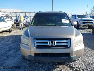 2007 Honda Pilot EX-L with VIN 5FNYF28537B024558, listed as a IAAI auction lot 41806196 with 196,256 mi miles. Bid and sale history available at carsss.com. Image 12.