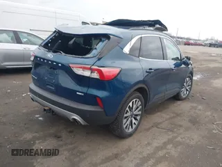 2020 Ford Escape Titanium with VIN 1FMCU9J98LUC00068, listed as a IAAI auction lot 41843755 with 42,525 mi miles and . Bid and sale history available at DreamBid. Image 4.