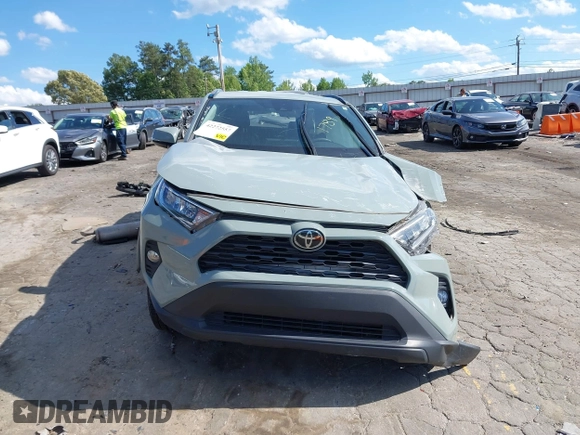 2020 Toyota RAV4 XLE with VIN 2T3W1RFV0LC081789, listed as a IAAI auction lot 42272557 with 91,399 mi miles and . Bid and sale history available at DreamBid. Image 6.
