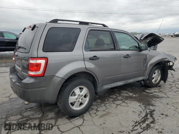 2012 Ford Escape XLT with VIN 1FMCU0D73CKA20143, listed as a Copart auction lot 63111075 with 136,942 mi miles and Salvage title. Bid and sale history available at DreamBid. Image 3.