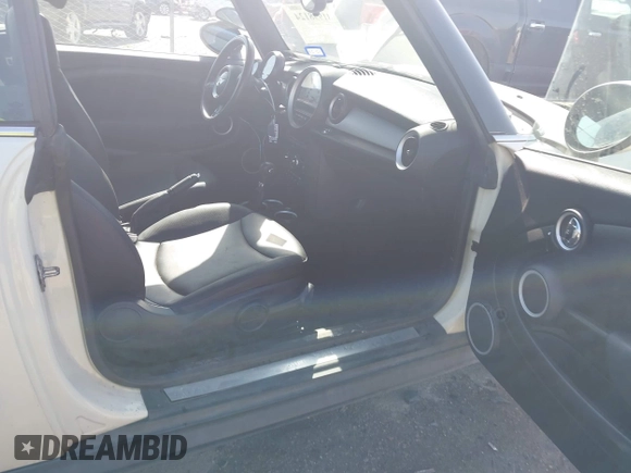 2013 MINI Convertible with VIN WMWZN3C58DT568824, listed as a IAAI auction lot 41998124 with 134,191 mi miles and . Bid and sale history available at DreamBid. Image 5.