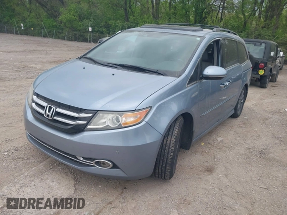 2014 Honda Odyssey Touring with VIN 5FNRL5H91EB081811, listed as a IAAI auction lot 42153920 with 16 mi miles and . Bid and sale history available at DreamBid. Image 17.