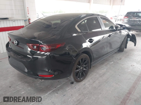 2024 Mazda 3 S Select Sport with VIN 3MZBPABM1RM408945, listed as a IAAI auction lot 42398805 with 42,283 mi miles and . Bid and sale history available at DreamBid. Image 4.