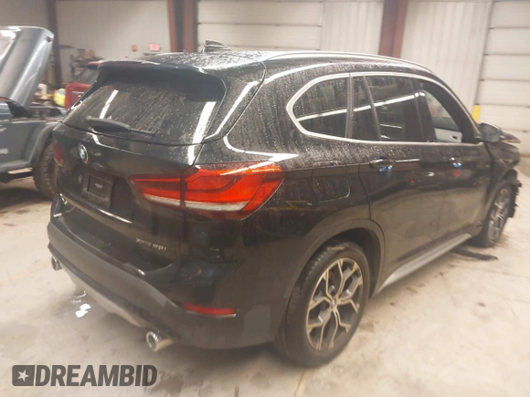 2021 BMW X1 xDrive28i with VIN WBXJG9C00M5T76421, listed as a IAAI auction lot 41918429 with 29,971 mi miles. Bid and sale history available at carsss.com. Image 4.