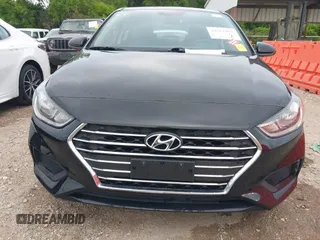 2021 Hyundai Accent SE with VIN 3KPC24A62ME147077, listed as a IAAI auction lot 42013901 with 59,363 mi miles. Bid and sale history available at carsss.com. Image 6.