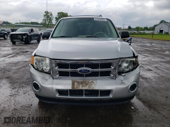 2010 Ford Escape XLS with VIN 1FMCU9C78AKD21851, listed as a Copart auction lot 61444945 with 70,404 mi miles and Clean title. Bid and sale history available at DreamBid. Image 5.