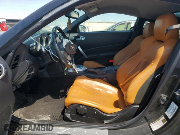 2007 Nissan 350Z with VIN JN1BZ34D27M504665, listed as a Copart auction lot 74428404 with 142,778 mi miles and Salvage Title. Bid and sale history available at DreamBid. Image 7.