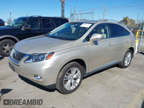 2011 Lexus RX 450h with VIN JTJBC1BAXB2420753, listed as a IAAI auction lot 41823358 with 102,714 mi miles and . Bid and sale history available at DreamBid. Image 17.