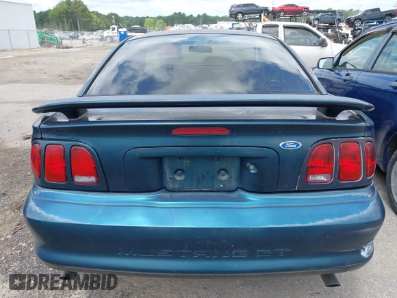 1996 Ford Mustang GT z VIN 1FALP42XXTF137304, wystawiony jako IAAI lot #42464808 z przebiegiem 166 565 mil mil oraz . Historia ofert i sprzedaży dostępna na DreamBid. Obrazek 17.