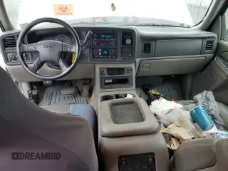 2005 GMC Yukon XL SLE z VIN 1GKEC16Z25J175610, wystawiony jako Copart lot #51051785 z przebiegiem 271 619 mil mil oraz Szkoda całkowita • Salvage title. Historia ofert i sprzedaży dostępna na DreamBid. Obrazek 8.