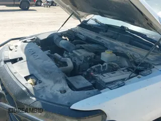 2023 Ram 1500 Tradesman z VIN 1C6SRFGT5PN553622, wystawiony jako IAAI lot #42935816 z przebiegiem 89 940 mil mil oraz . Historia ofert i sprzedaży dostępna na DreamBid. Obrazek 19.