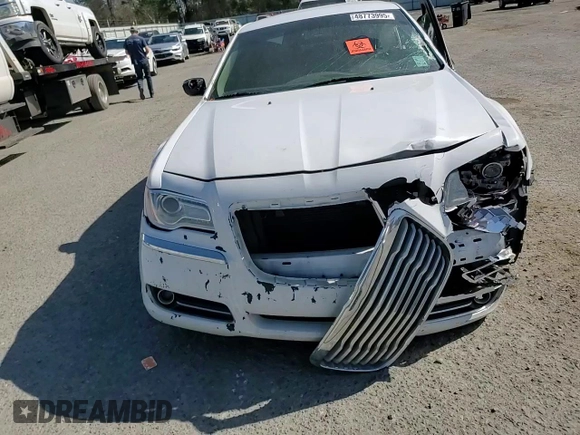 2014 Chrysler 300 with VIN 2C3CCAEG5EH375311, listed as a Copart auction lot 48773995 with 197,547 mi miles and Salvage Title. Bid and sale history available at carsss.com. Image 11.