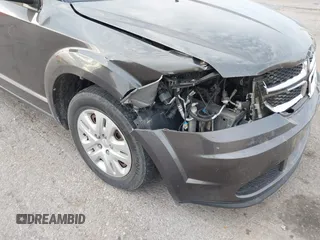2018 Dodge Journey SE with VIN 3C4PDCABXJT170150, listed as a IAAI auction lot 40715756 with 113,330 mi miles and . Bid and sale history available at DreamBid. Image 6.