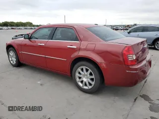 2010 Chrysler 300 Touring with VIN 2C3CA5CV8AH154245, listed as a Copart auction lot 71257774 with 121,489 mi miles and Salvage Title. Bid and sale history available at carsss.com. Image 2.