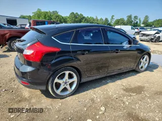 2014 Ford Focus Titanium with VIN 1FADP3N21EL274263, listed as a Copart auction lot 64017905 with 211,775 mi miles and Clean title. Bid and sale history available at DreamBid. Image 3.