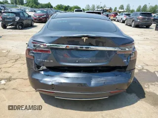 2016 Tesla Model S 90D с VIN 5YJSA1E28GF129962, выставлен на аукционе Copart как лот 59973365 с пробегом 57 944 миль миль и Списание • Salvage title. История ставок и продаж доступна на DreamBid. Изображение 6.