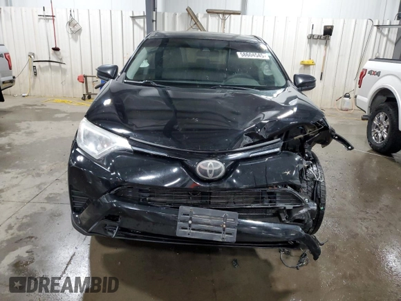 2018 Toyota RAV4 LE with VIN 2T3BFREV6JW763007, listed as a Copart auction lot 58604545 with 107,683 mi miles and Salvage title. Bid and sale history available at DreamBid. Image 5.
